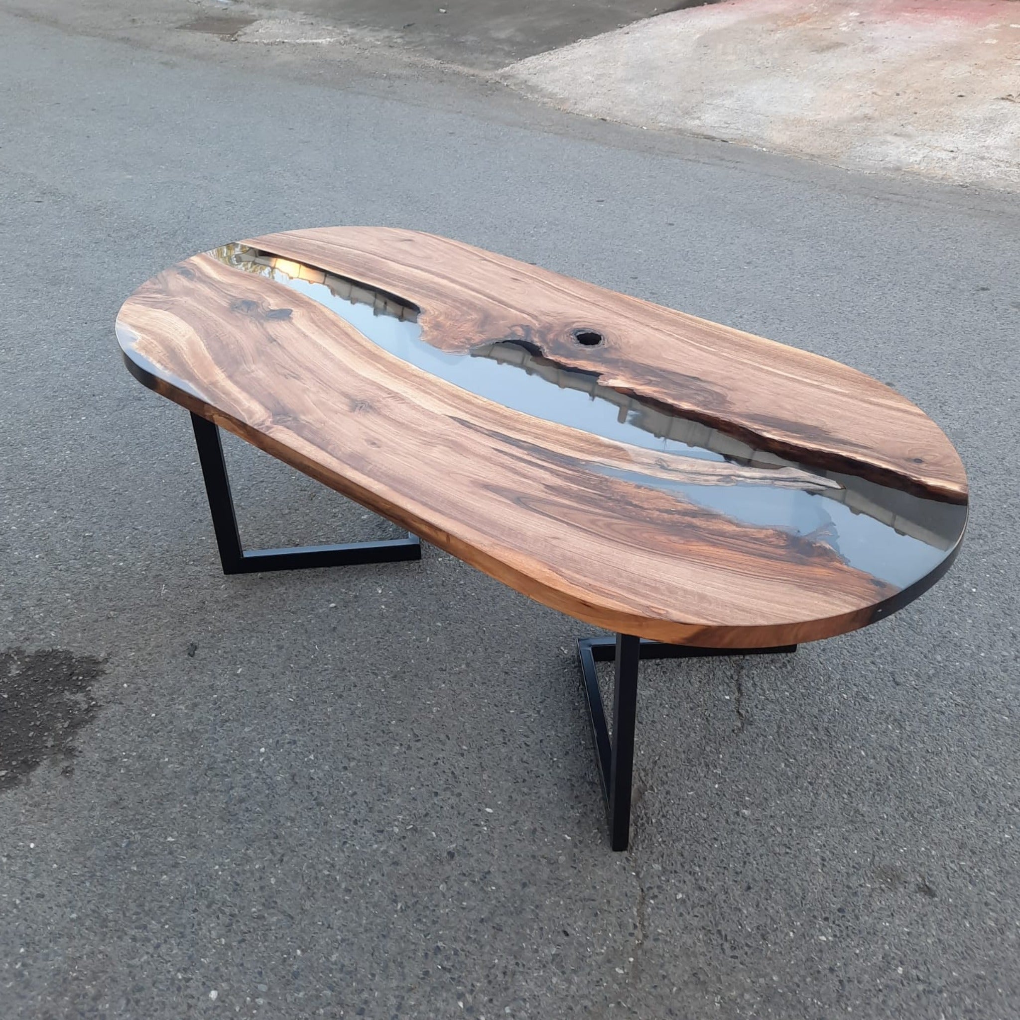 Oval epoxy river dining table