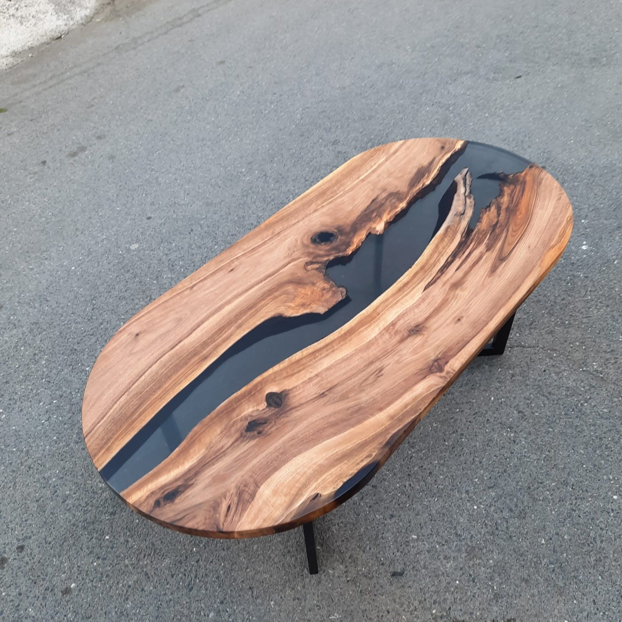 Oval epoxy river dining table